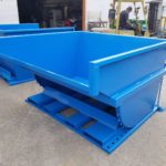 photo of large custom self dump hopper painted ready for shipping to Toronto